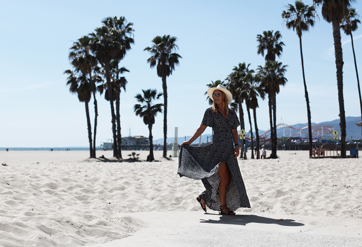 Fashion blogger Lisa Hamilton from See Want Shop wearing a Privacy Please maxi dress from Revolve Clothing at Venice Beach