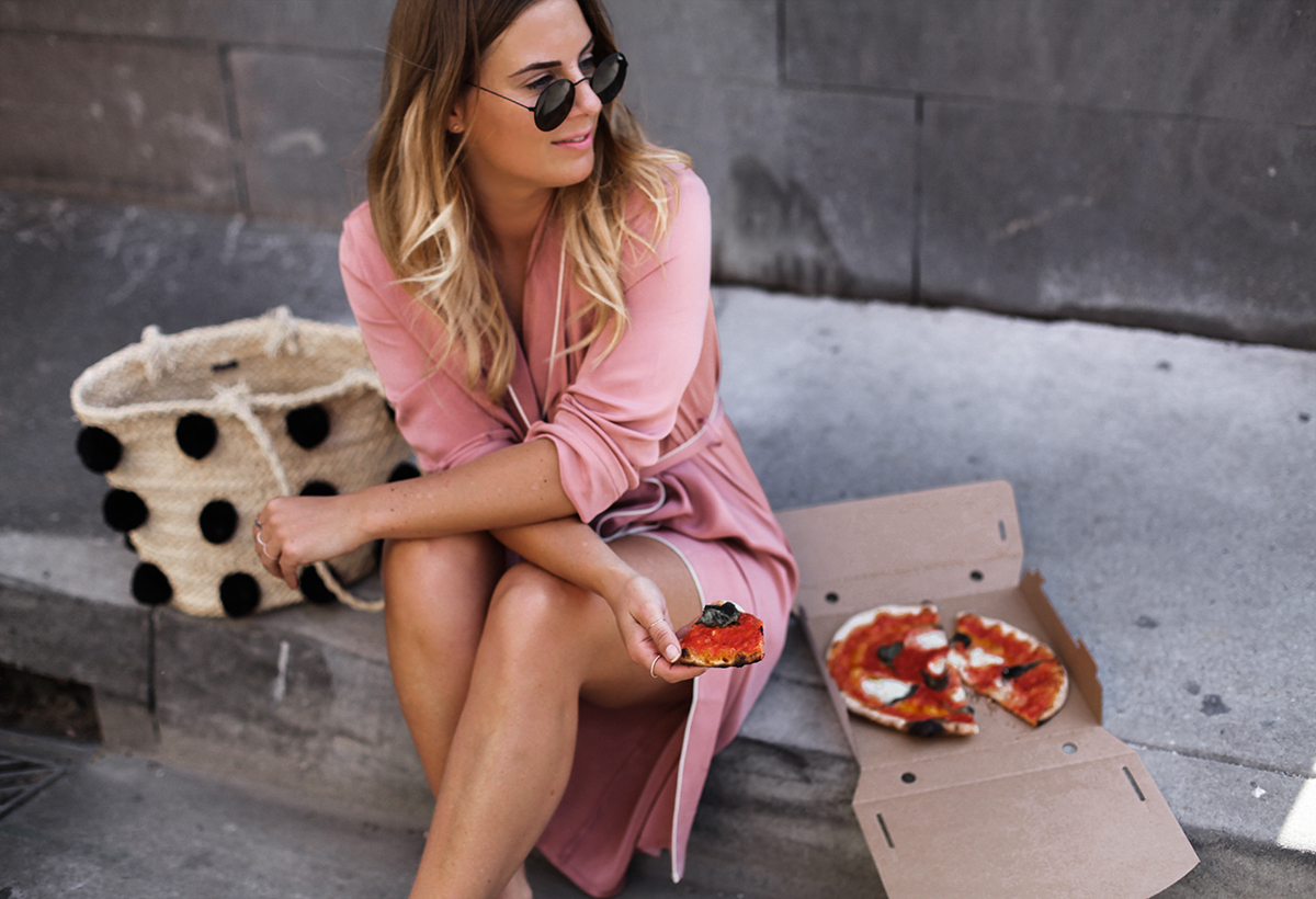 Blogger Lisa Hamilton eating takeaway pizza