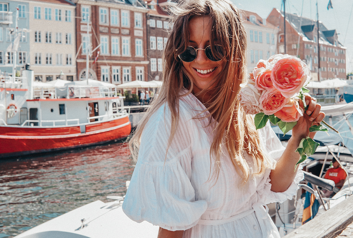 Laughing girl with flowers