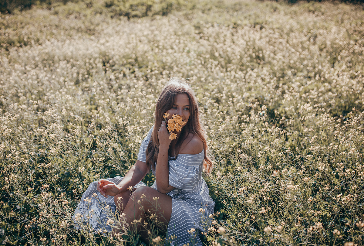 sitting in daffodil field