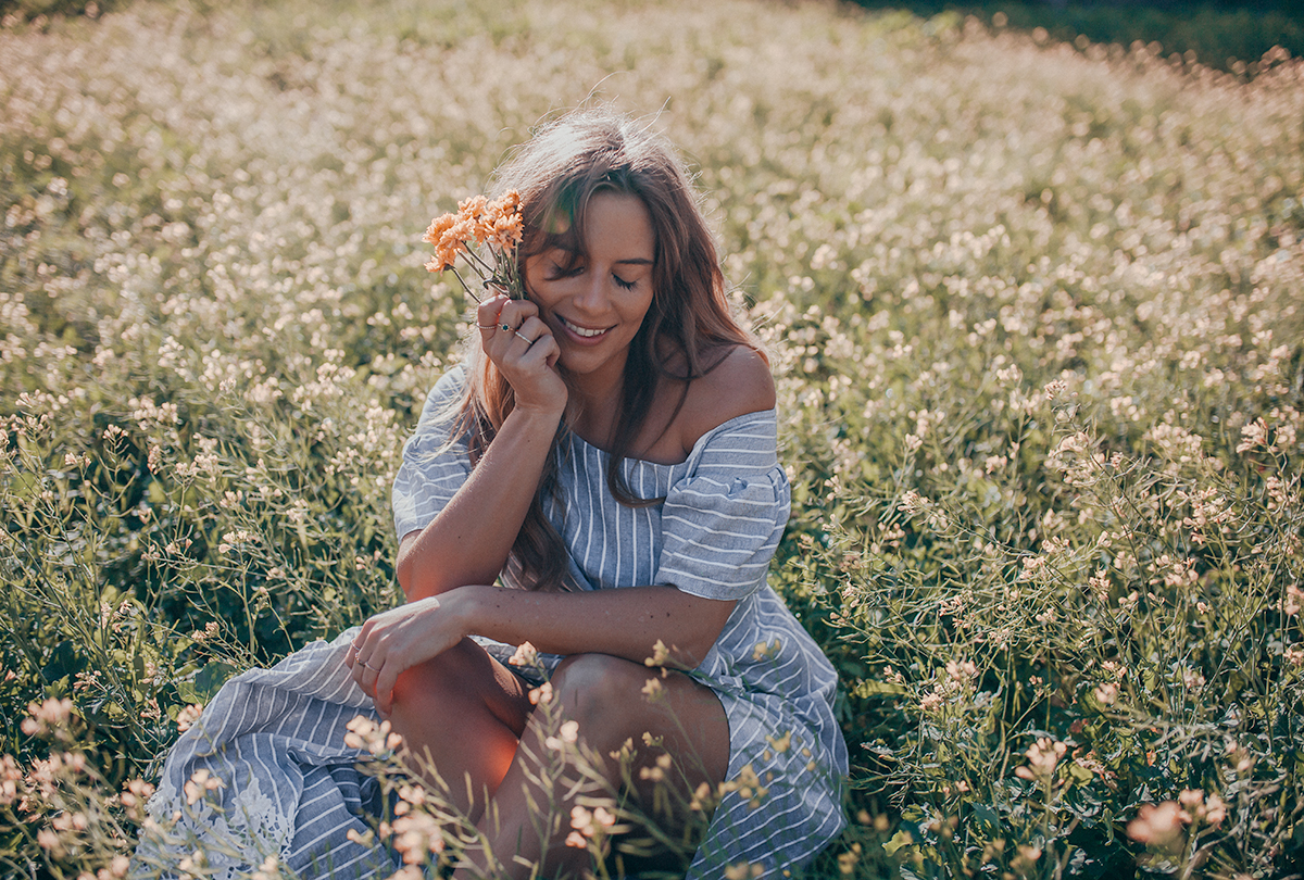 wearing off the shoulder Steele dress